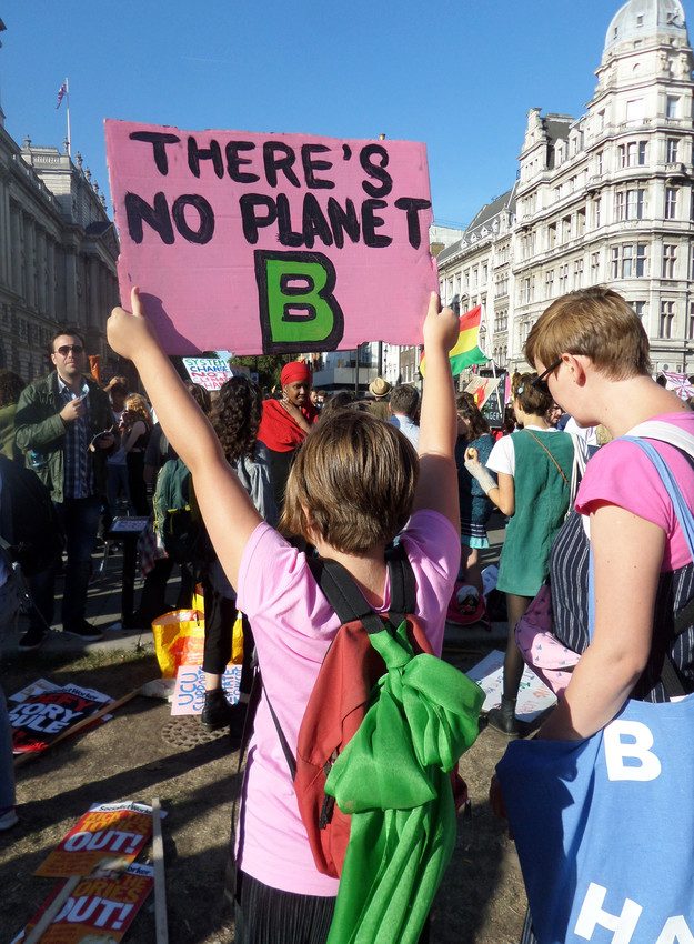 Climate change activists march in the UK to raise awareness of the climate emergency. 