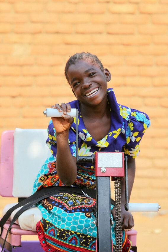 Gilberta is now able to access education thanks to her new handcycle.